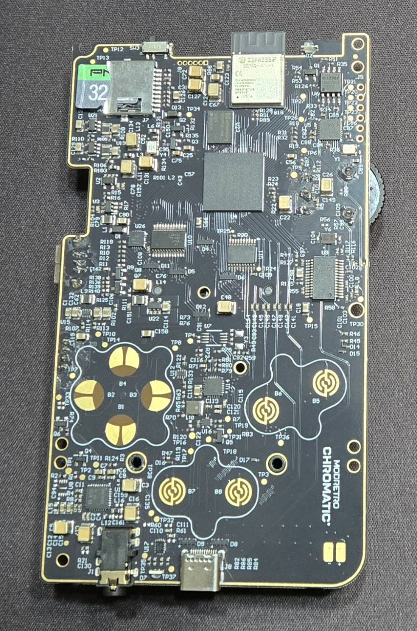 Chromatic main board with the installed microSD card and socket circled at the upper left